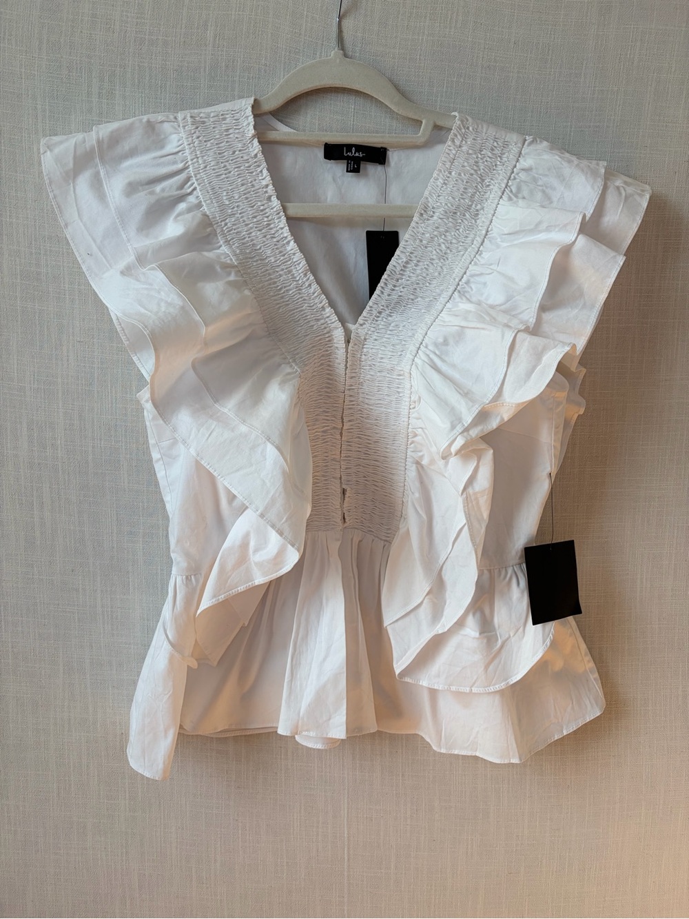 Lulu's White Ruffle V-Neck Peplum Blouse